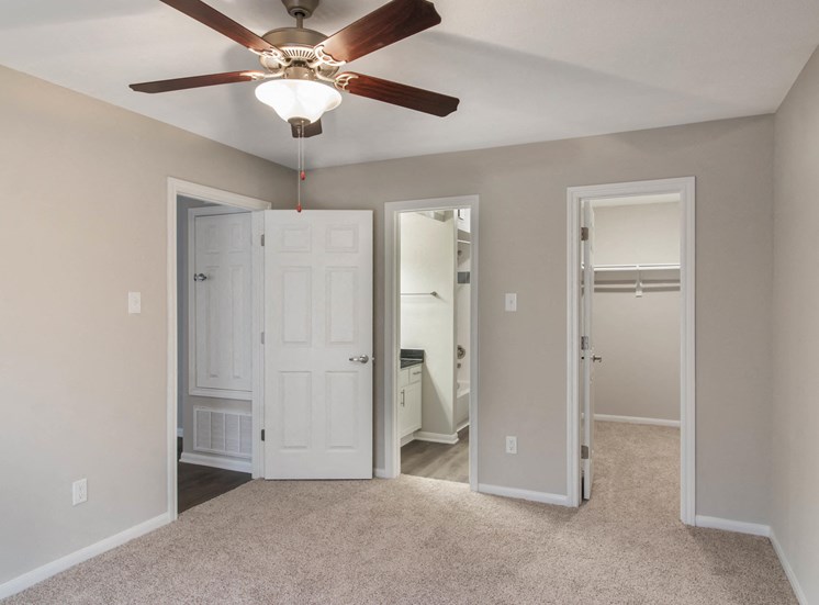 Carpeted Bedroom with Ceiling Fan and En Suite Bathroom